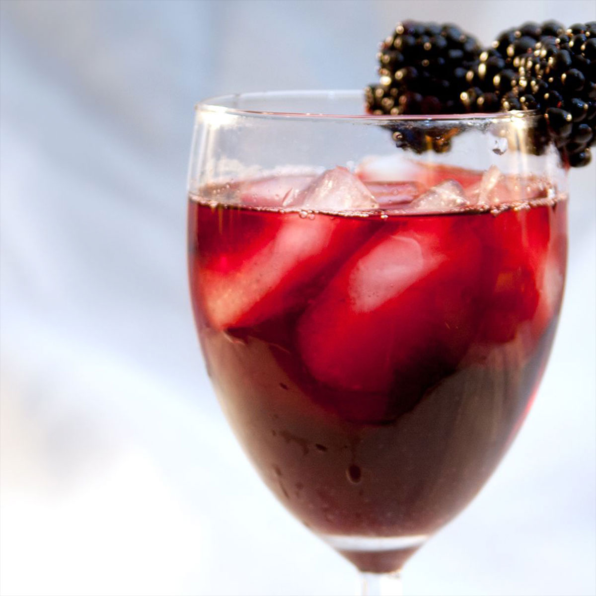 Red wine cocktail with soda & lime